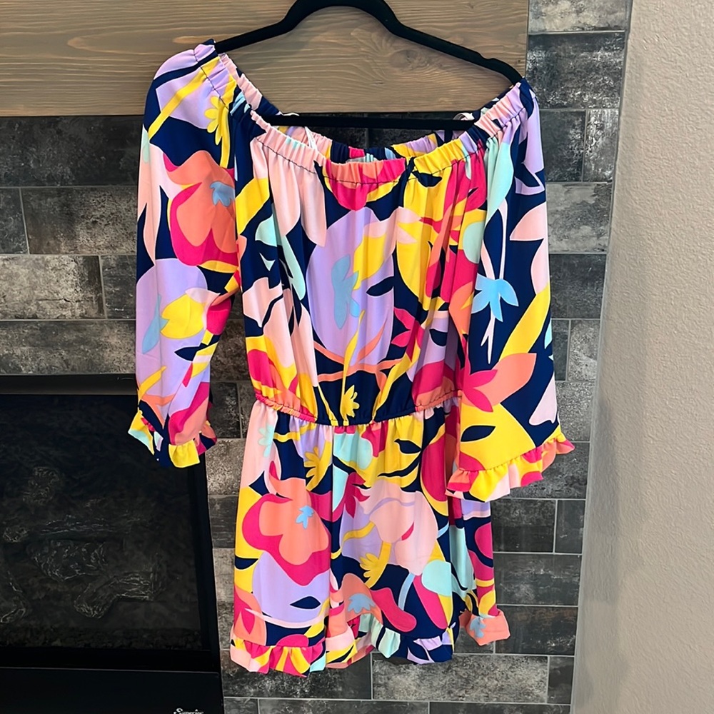 Laundry romper. never worn. New without tags.